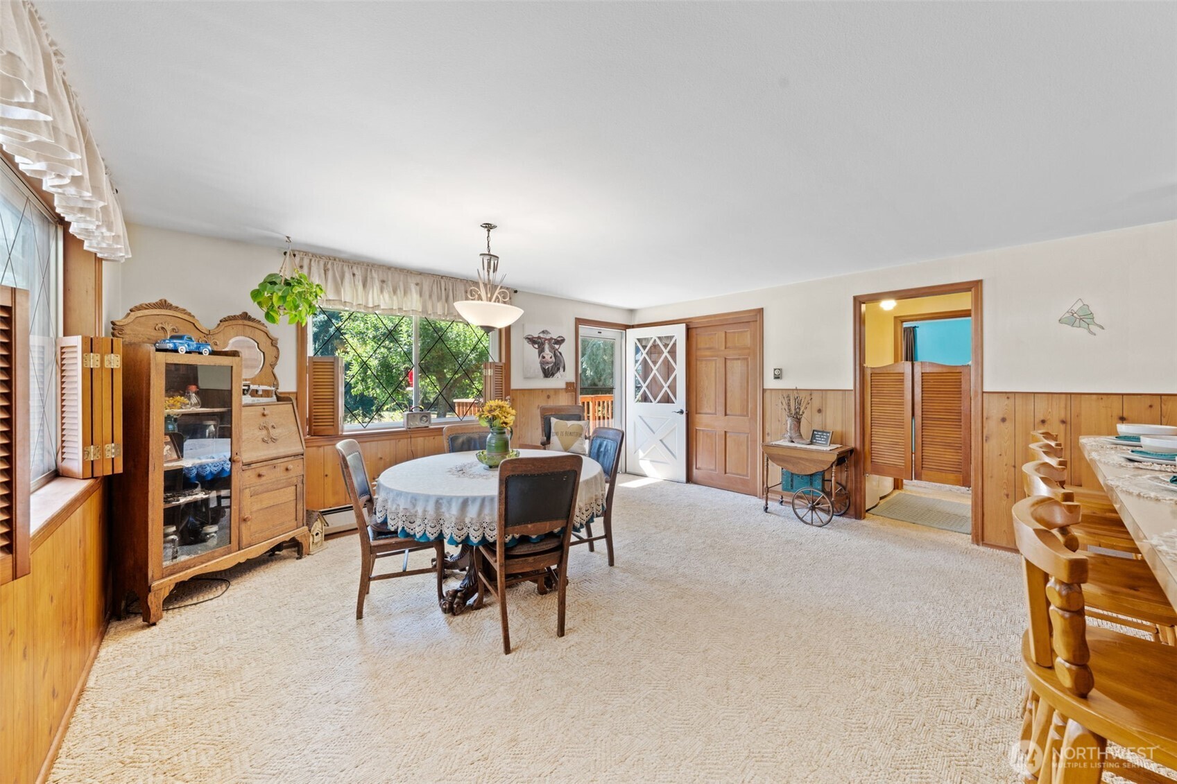 1906 164th Street South Spanaway, WA 98387 - Photo 10 of 35 a view of a livingroom with furniture and a potted plant