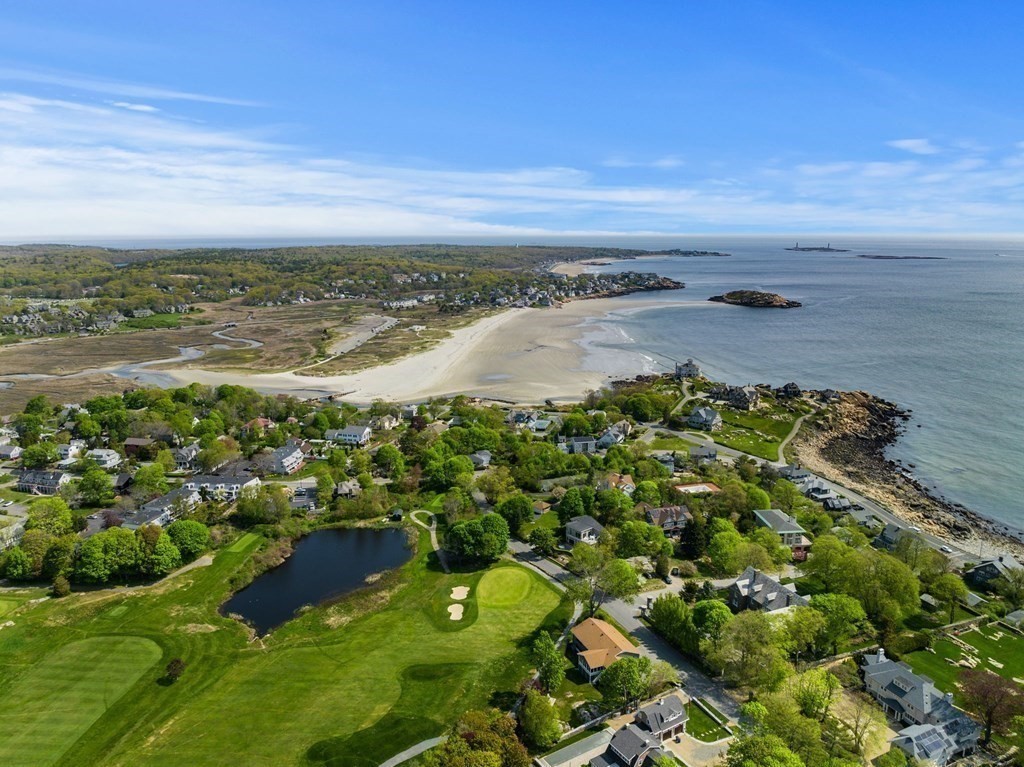 19 Atlantic Road, Unit 12 Gloucester, MA 01930 - Photo 4 of 35 a view of a lake with an outdoor space