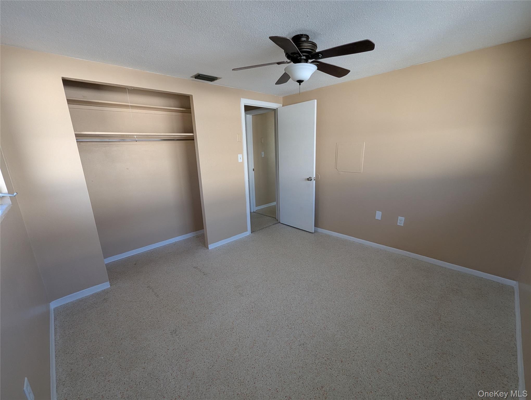 7416 Star Dust Drive Port Richey, FL 34668 - Photo 25 of 44 a view of an empty room