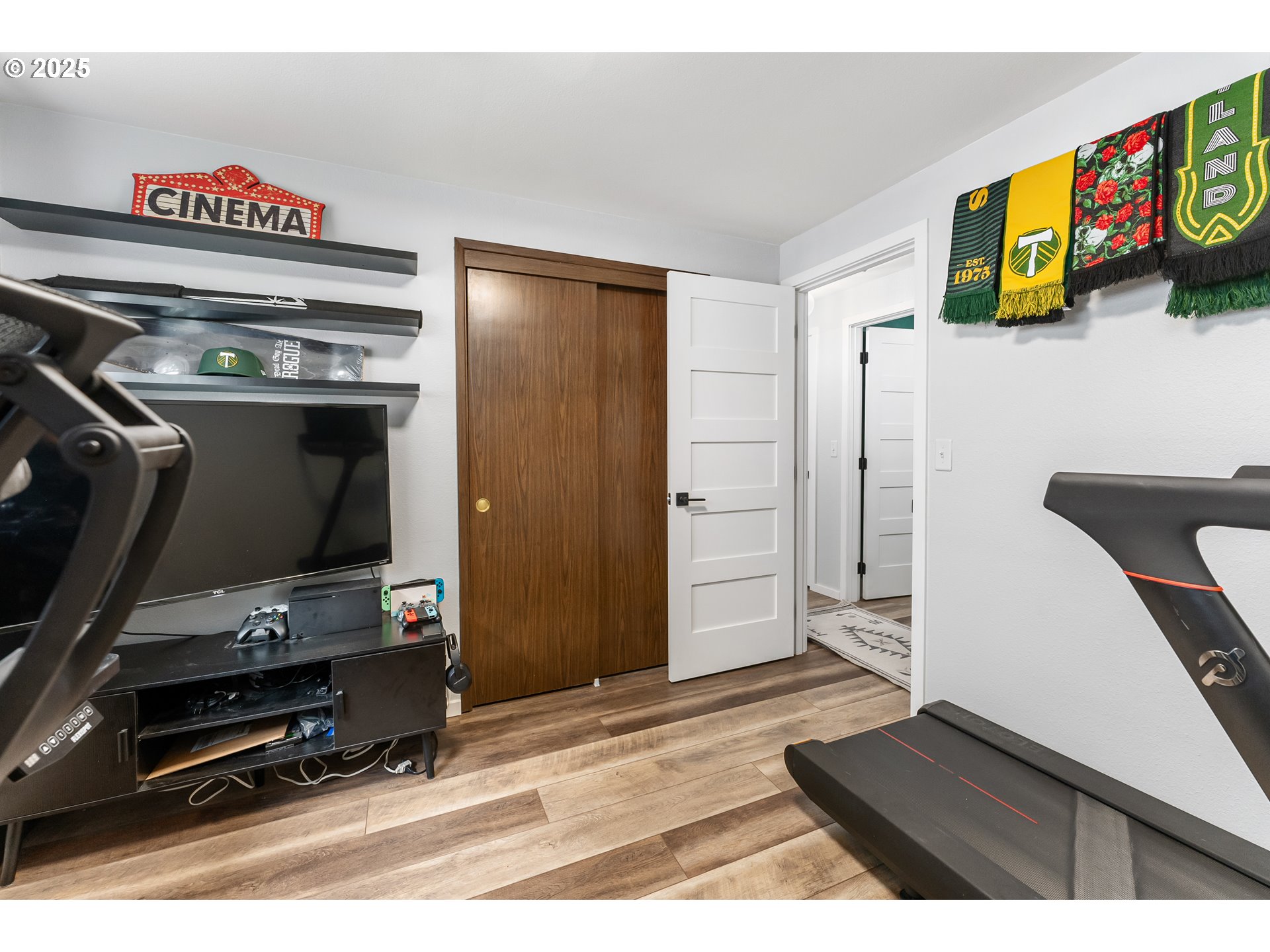 9145 Southeast Oak Street Portland, OR 97216 - Photo 17 of 27 a living room with furniture and a flat screen tv