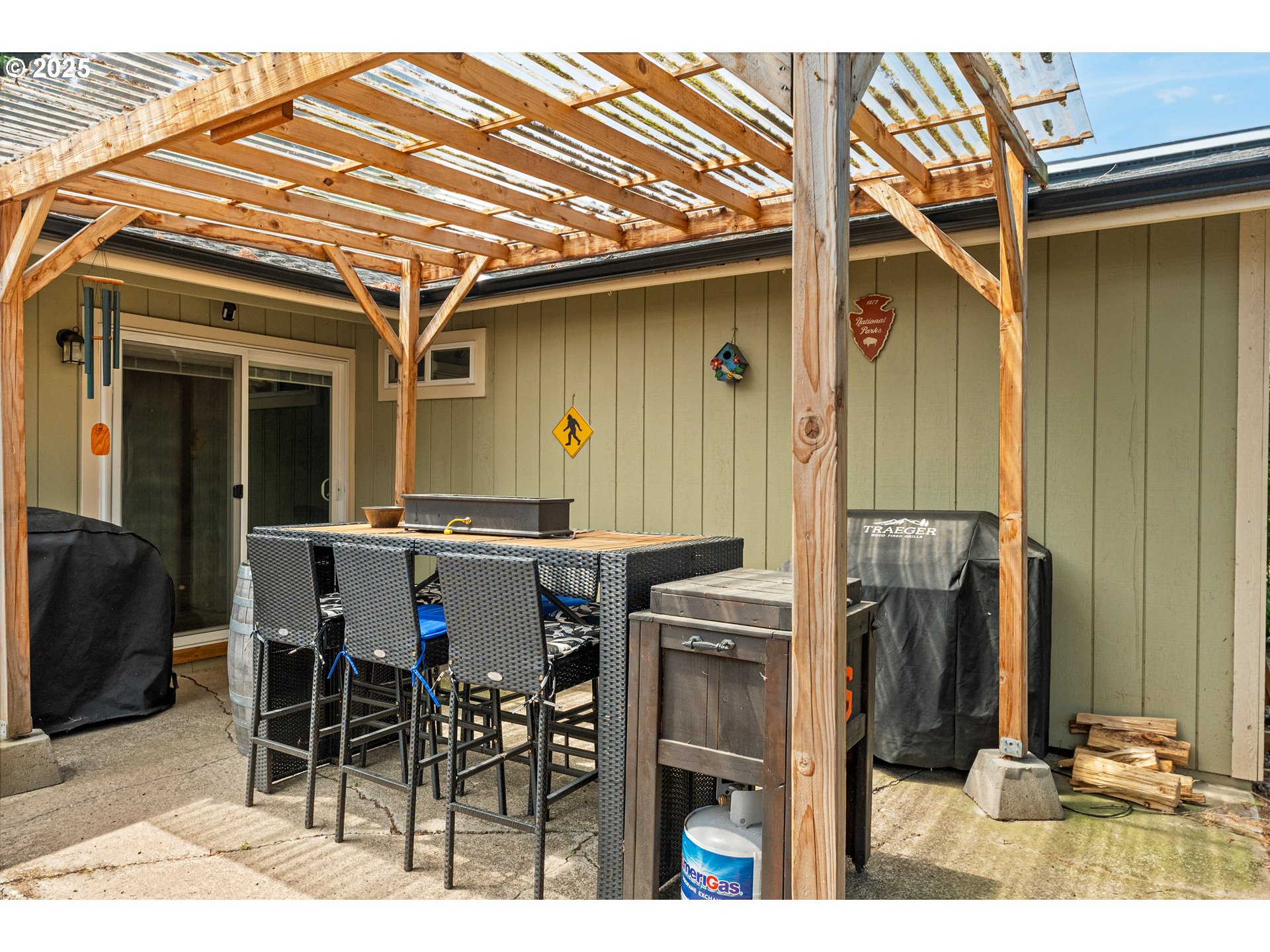 9145 Southeast Oak Street Portland, OR 97216 - Photo 18 of 27 a view of a patio with table and chairs