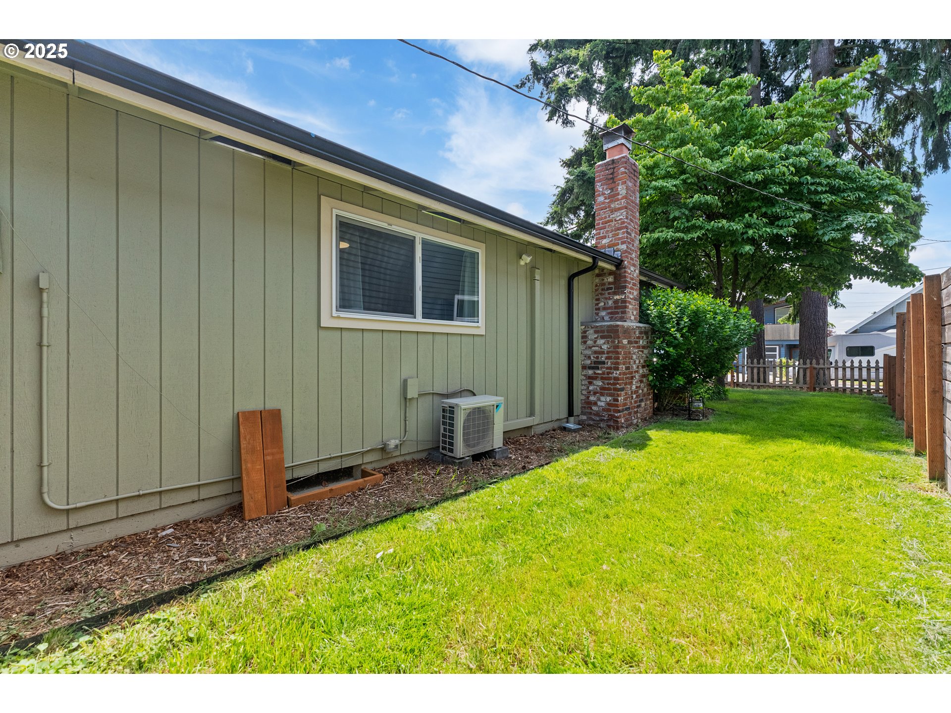 9145 Southeast Oak Street Portland, OR 97216 - Photo 25 of 27 a backyard of a house with seating space