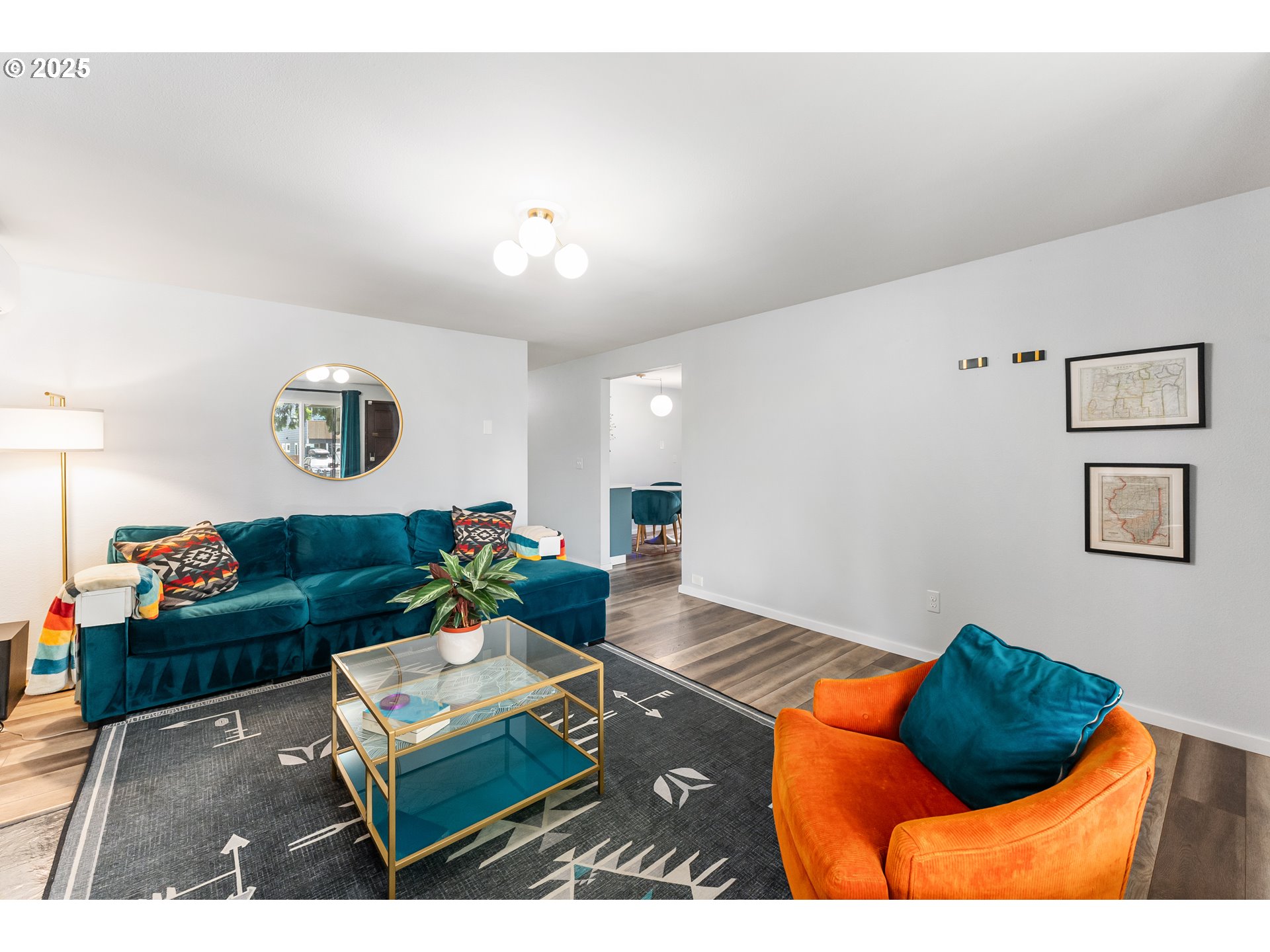 9145 Southeast Oak Street Portland, OR 97216 - Photo 6 of 27 a living room with furniture and rug