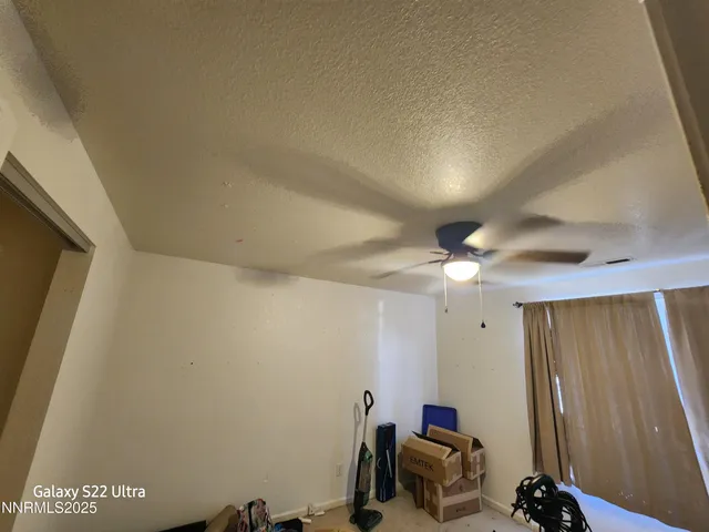 a room with furniture and a window