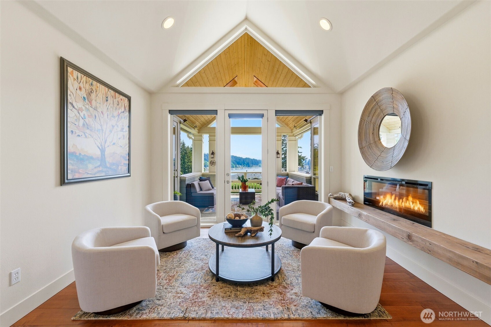 3915 Bay View Lane Gig Harbor, WA 98332 - Photo 11 of 40 a living room with furniture and a large window