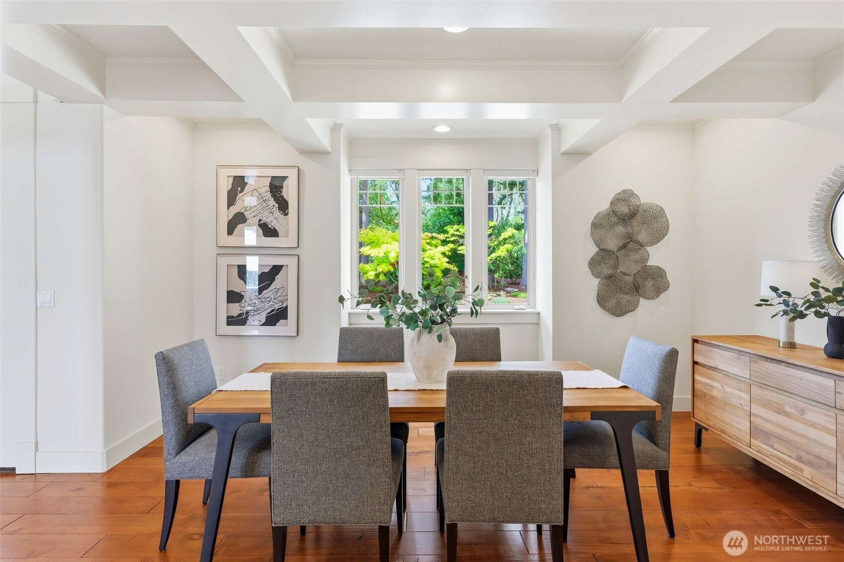 3915 Bay View Lane Gig Harbor, WA 98332 - Photo 19 of 40 a view of a dining room with furniture and wooden floor