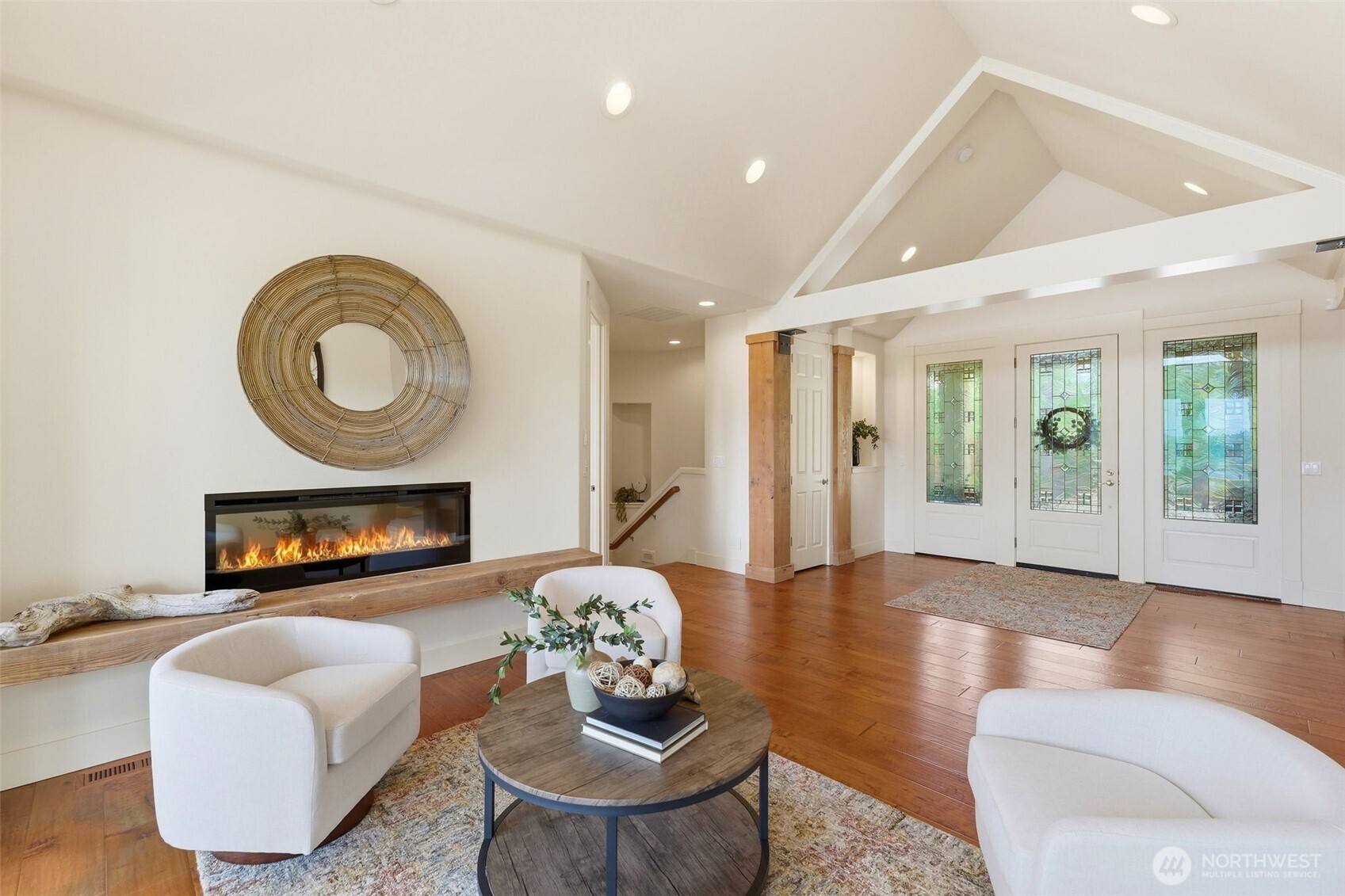 3915 Bay View Lane Gig Harbor, WA 98332 - Photo 20 of 40 a living room with furniture and a wooden floor