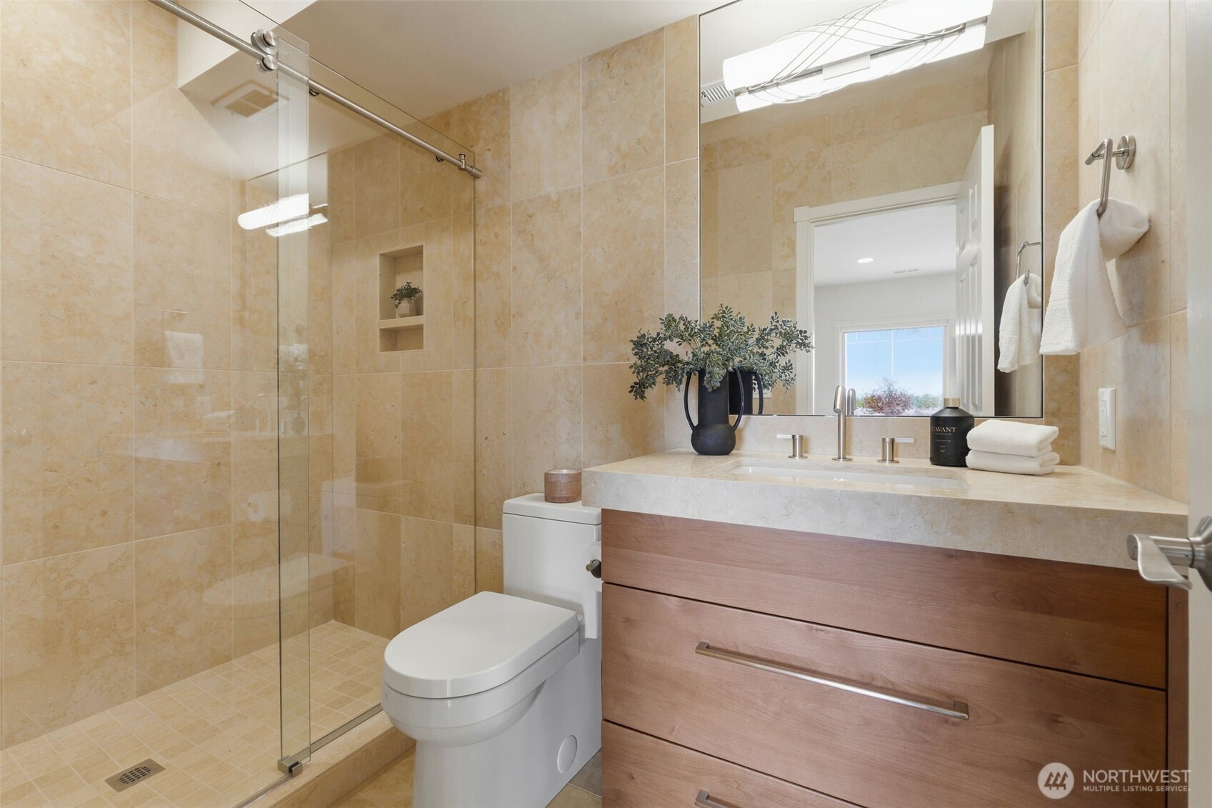 3915 Bay View Lane Gig Harbor, WA 98332 - Photo 35 of 40 a bathroom with a sink a toilet and shower