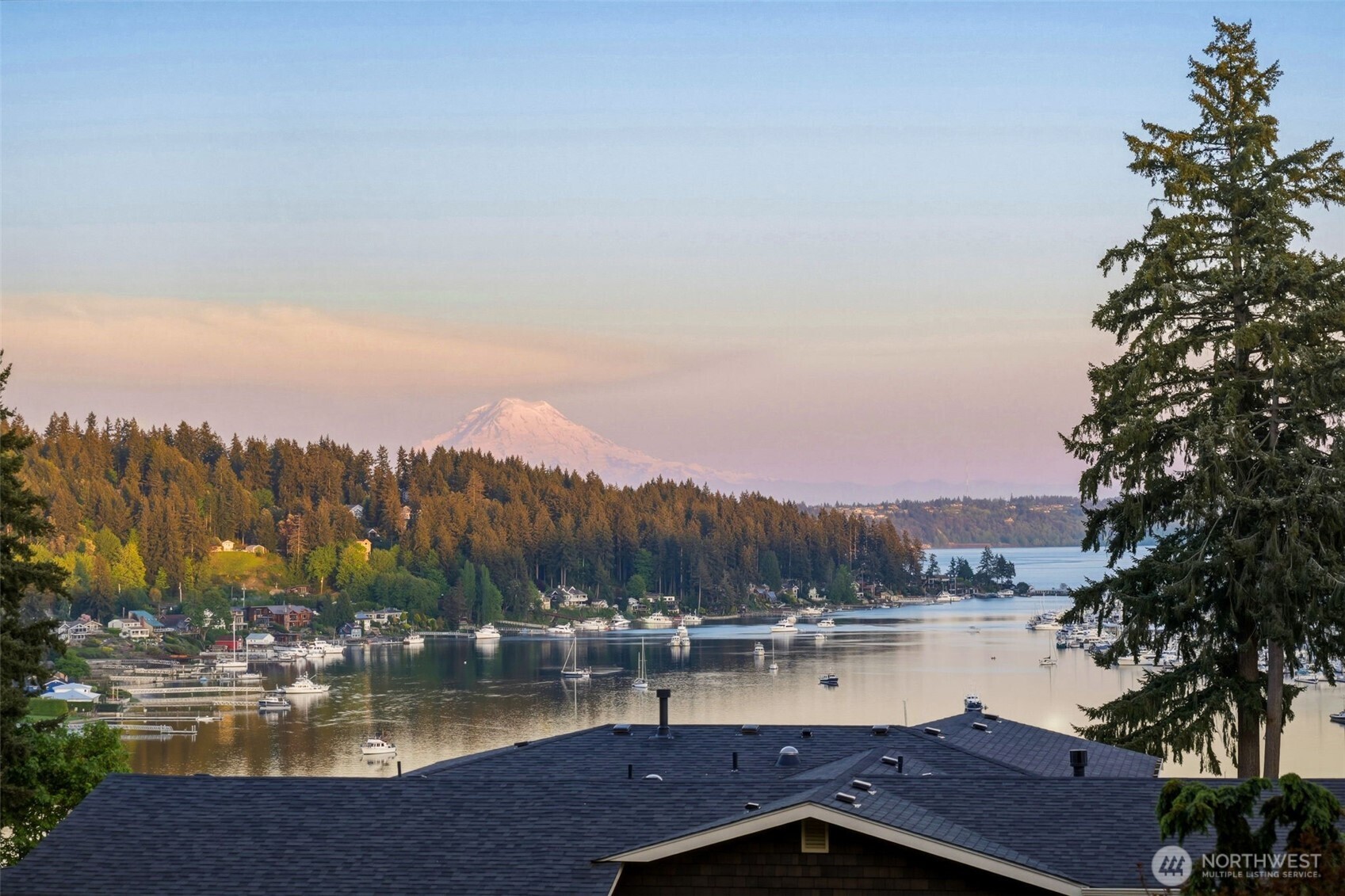 3915 Bay View Lane Gig Harbor, WA 98332 - Photo 4 of 40 a view of a lake with houses in the back