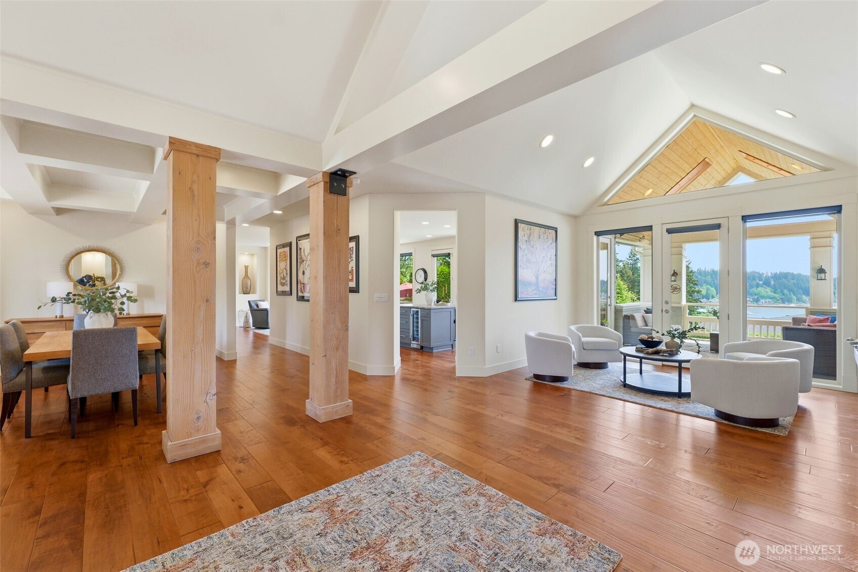 3915 Bay View Lane Gig Harbor, WA 98332 - Photo 10 of 40 a living room with furniture and a wooden floor
