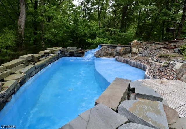 a view of a garden from a balcony