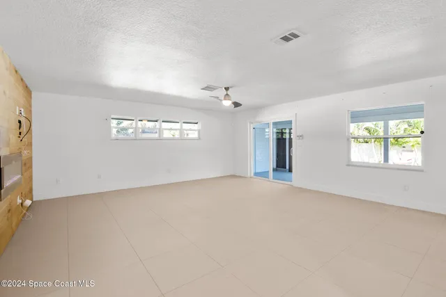 a view of a kitchen with furniture and a kitchen