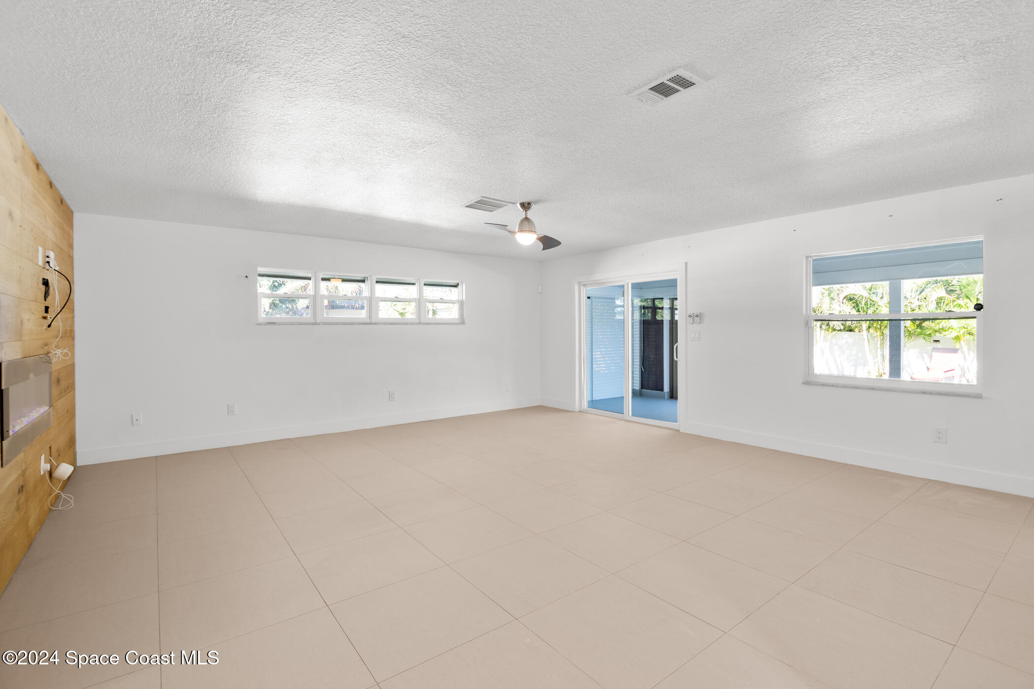 360 East Riviera Boulevard Indialantic, FL 32903 - Photo 12 of 26 a view of an empty room with a window