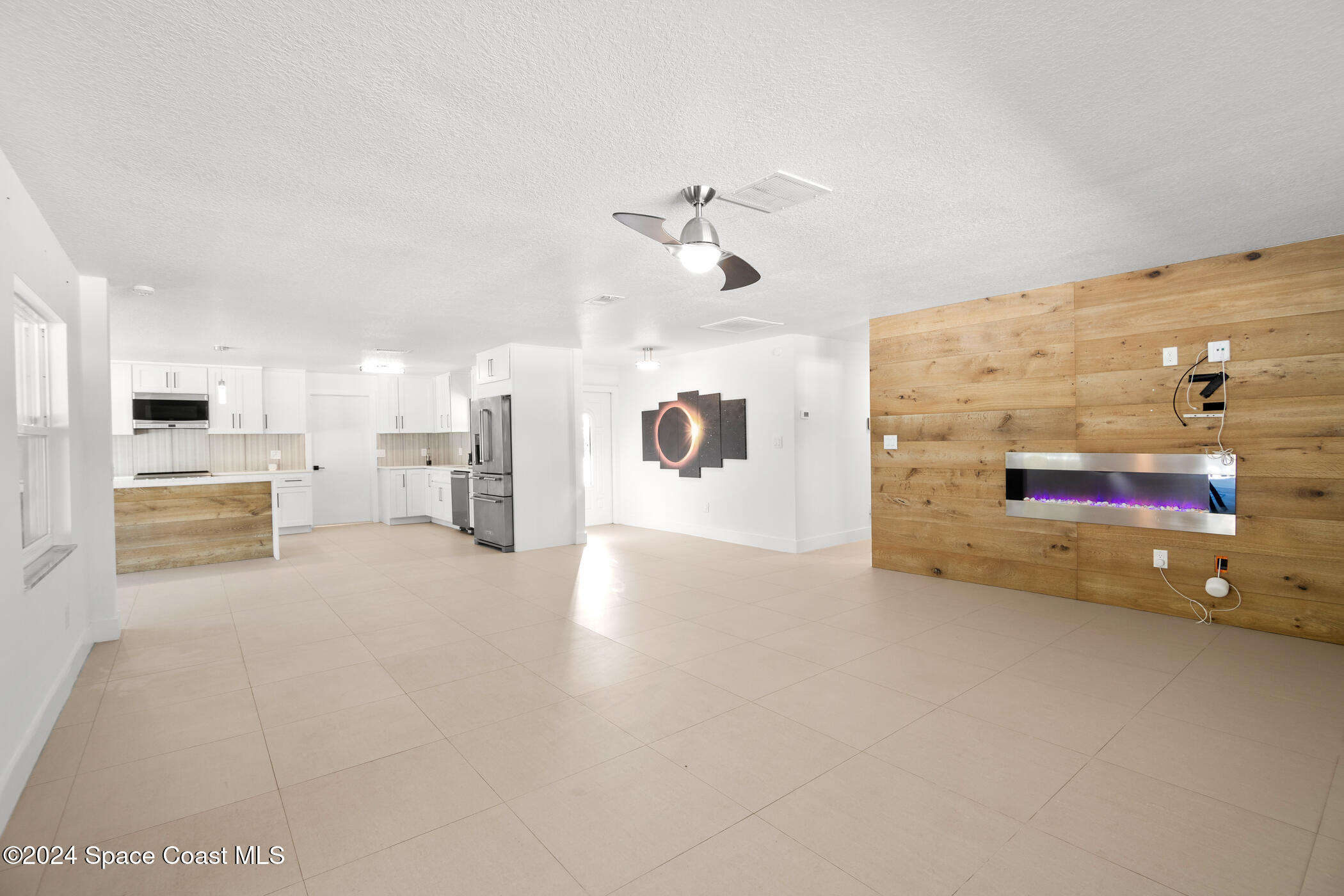 360 East Riviera Boulevard Indialantic, FL 32903 - Photo 13 of 26 a view of a kitchen with furniture and a kitchen