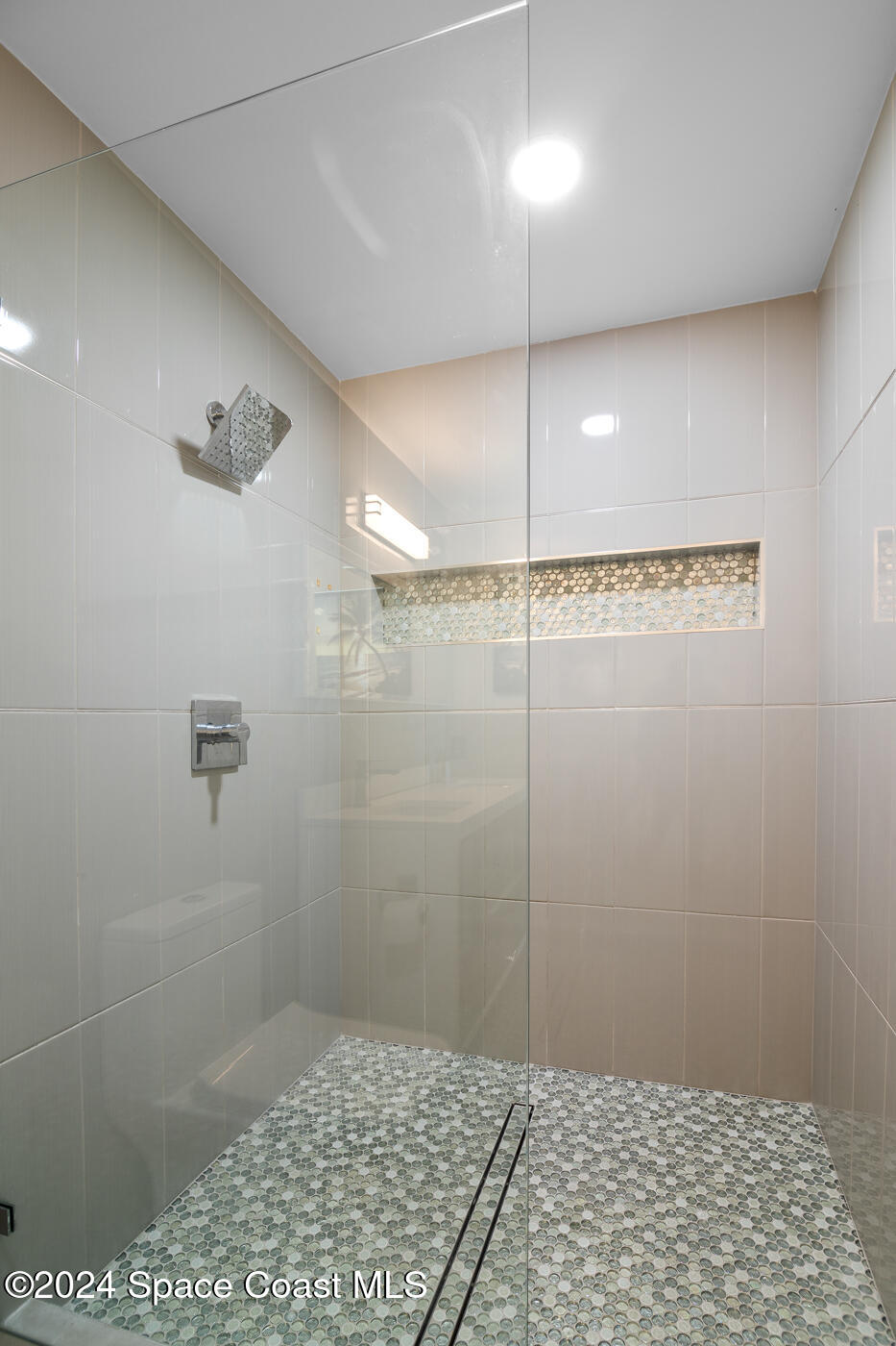 360 East Riviera Boulevard Indialantic, FL 32903 - Photo 16 of 26 a bathroom with a shower