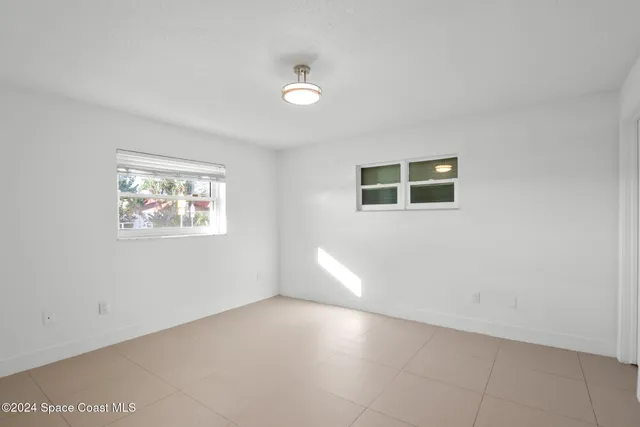 a bathroom with a double vanity sink toilet and a bathtub
