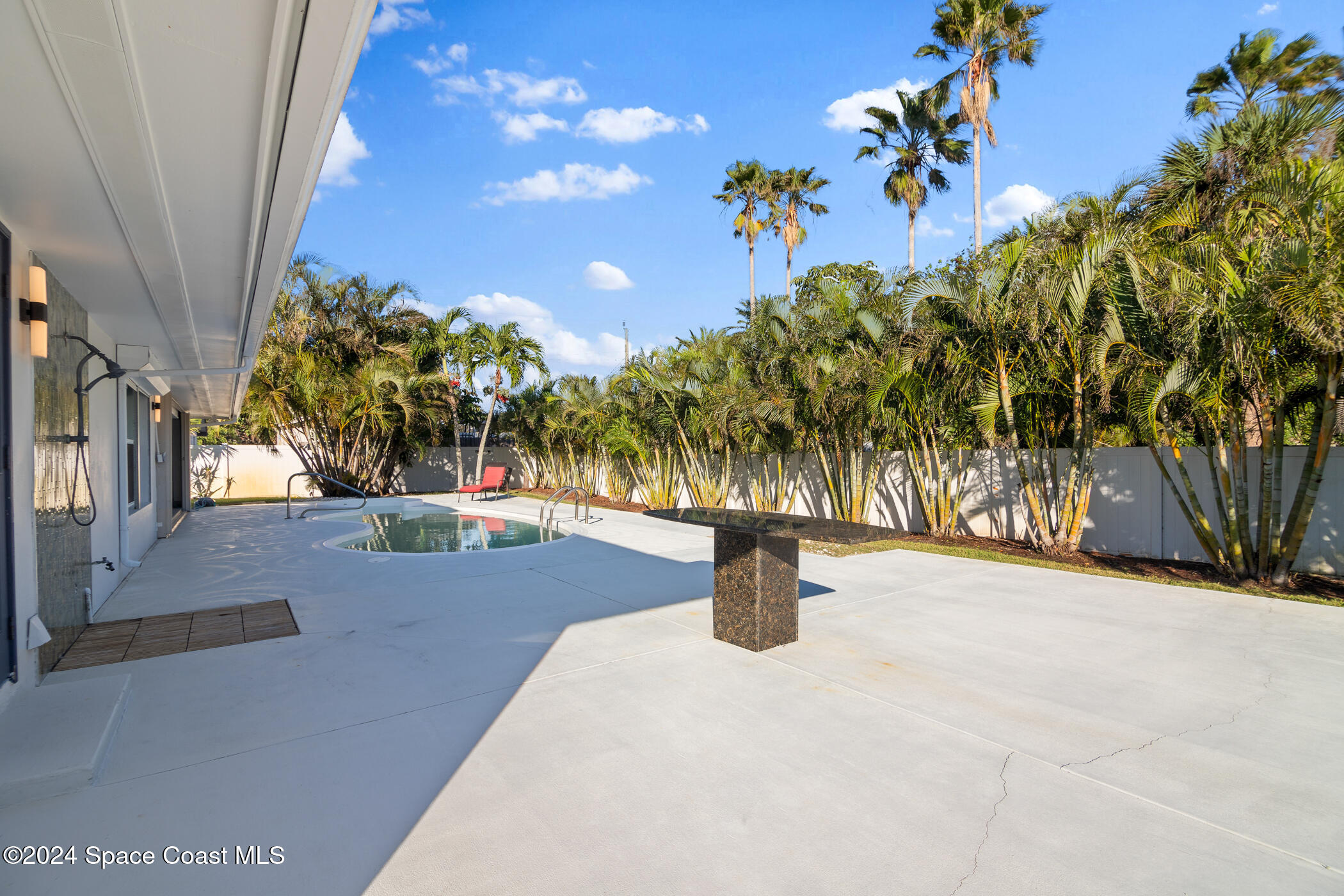 360 East Riviera Boulevard Indialantic, FL 32903 - Photo 23 of 26 a view of a house with a tree