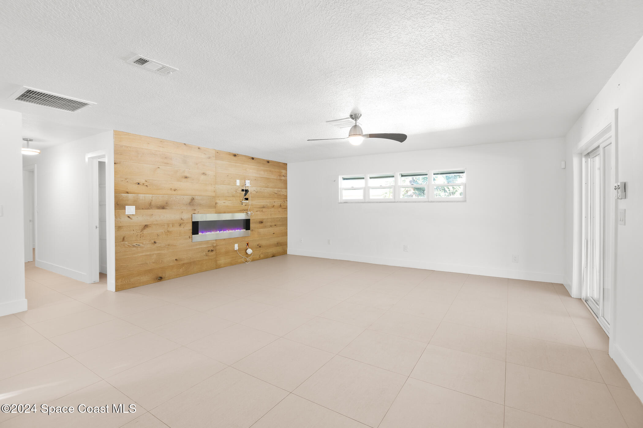 360 East Riviera Boulevard Indialantic, FL 32903 - Photo 10 of 26 a view of an empty room with a window