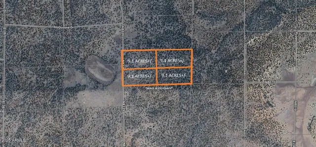 a view of a dry yard covered with snow