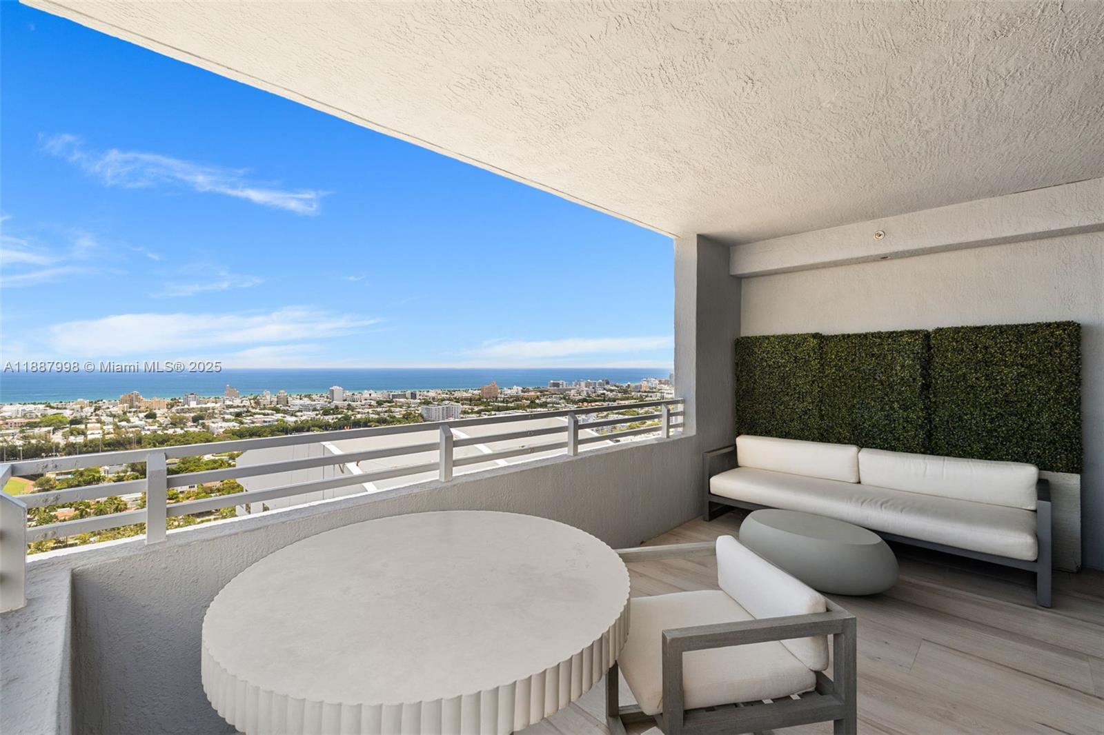 1330 West Avenue, Unit 3407 Miami Beach, FL 33139 - Photo 33 of 42 a bathroom with a sink and a mirror