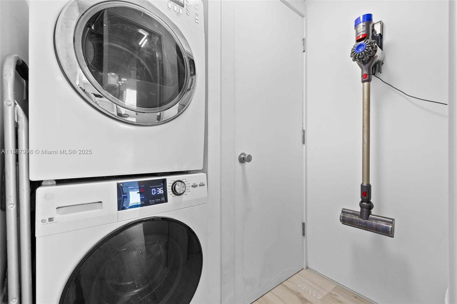 1330 West Avenue, Unit 3407 Miami Beach, FL 33139 - Photo 35 of 42 a utility room with dryer and washer