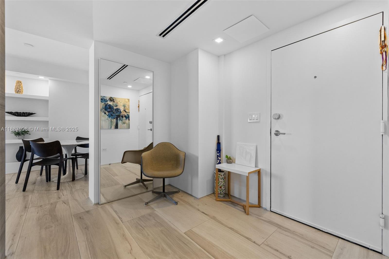 1330 West Avenue, Unit 3407 Miami Beach, FL 33139 - Photo 37 of 42 a view of a workspace with furniture and a window