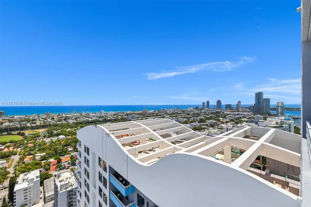 a view of a balcony with city view