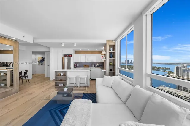 a living room with furniture and a table