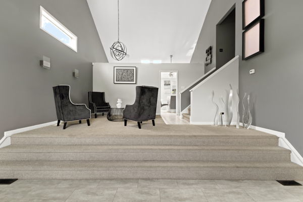 24222 Volbrecht Road Crete, IL 60417 - Photo 4 of 16 a view of livingroom with furniture and staircase