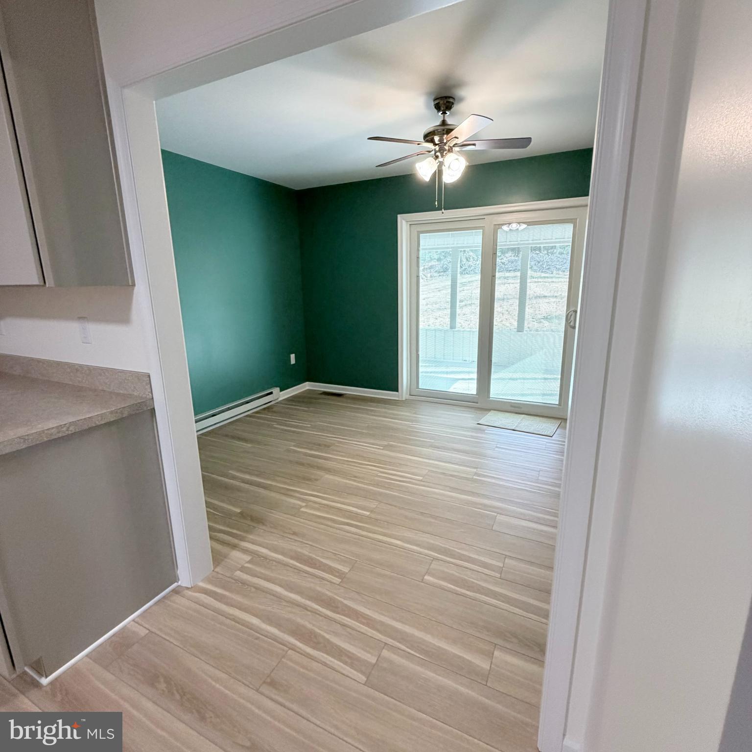 155 Buchanan Valley Road Orrtanna, PA 17353 - Photo 13 of 61 a view of an empty room with a chandelier fan