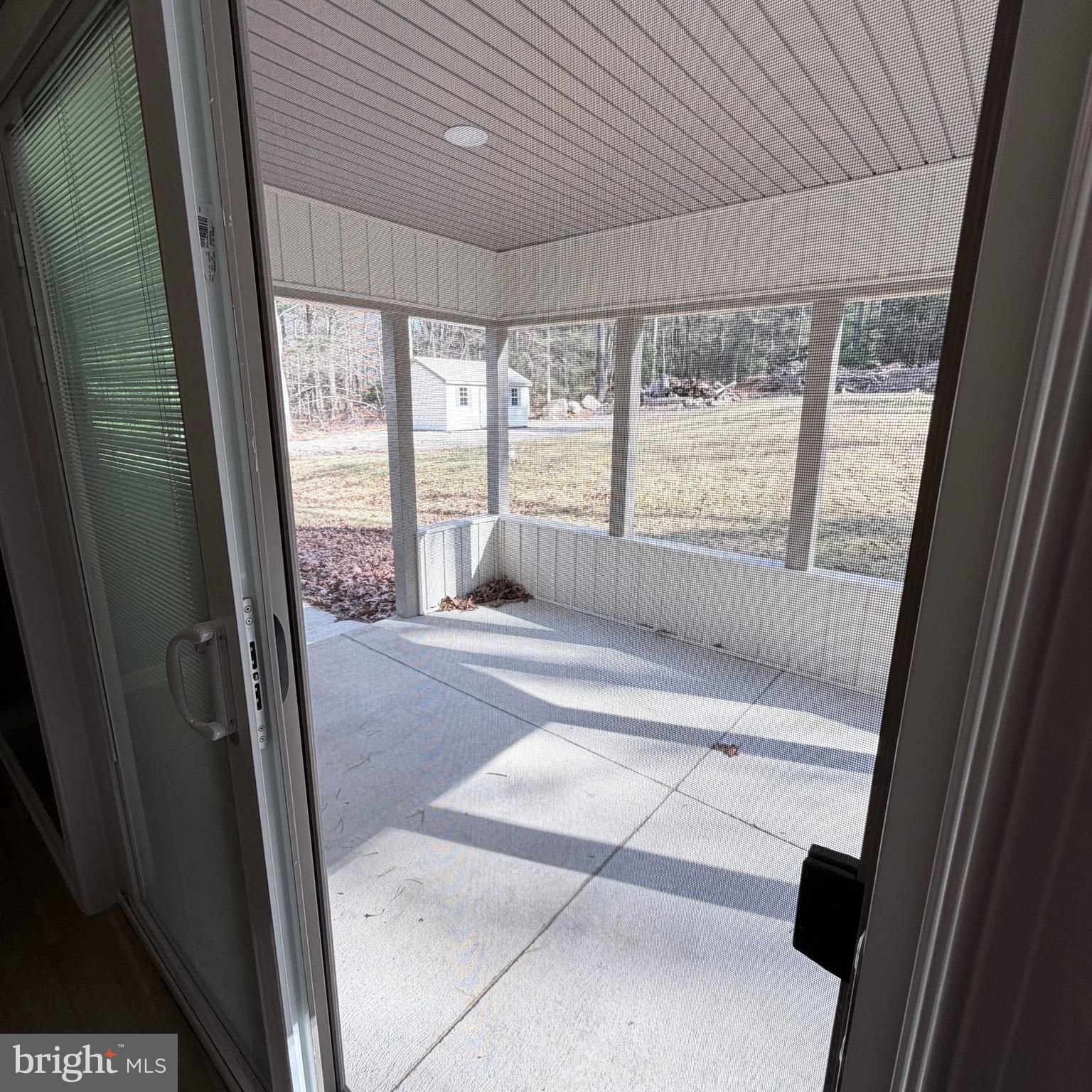 155 Buchanan Valley Road Orrtanna, PA 17353 - Photo 16 of 61 a view of an empty room with wooden floor and a window