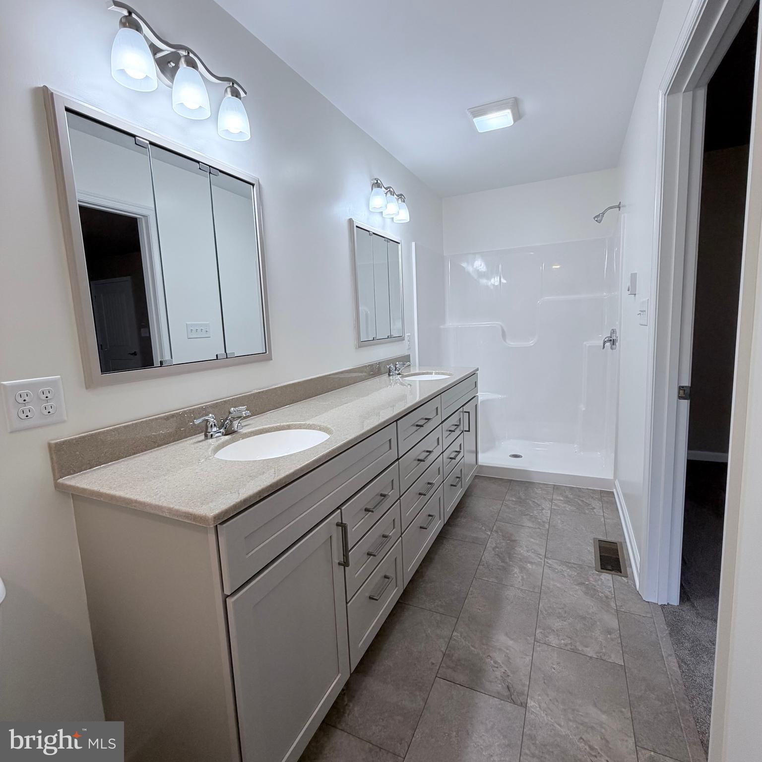 155 Buchanan Valley Road Orrtanna, PA 17353 - Photo 35 of 61 a bathroom with a double vanity sink and mirror