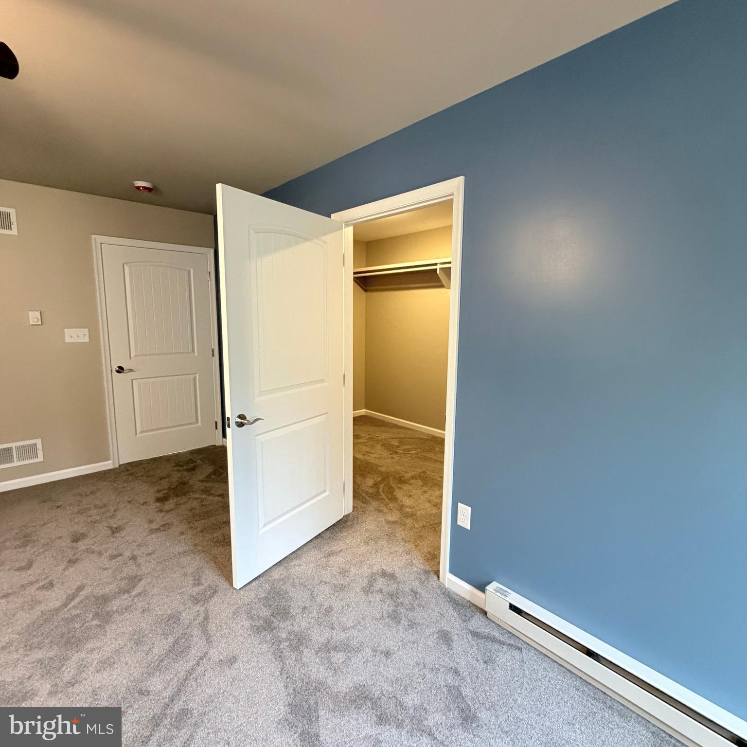 155 Buchanan Valley Road Orrtanna, PA 17353 - Photo 37 of 61 an empty room with a cabinet and a refrigerator