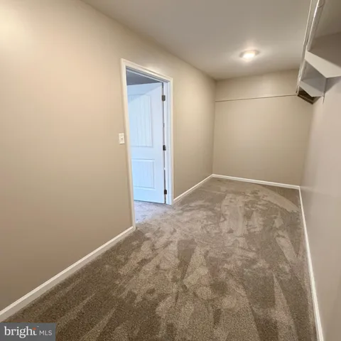 a view of a room with wooden roof