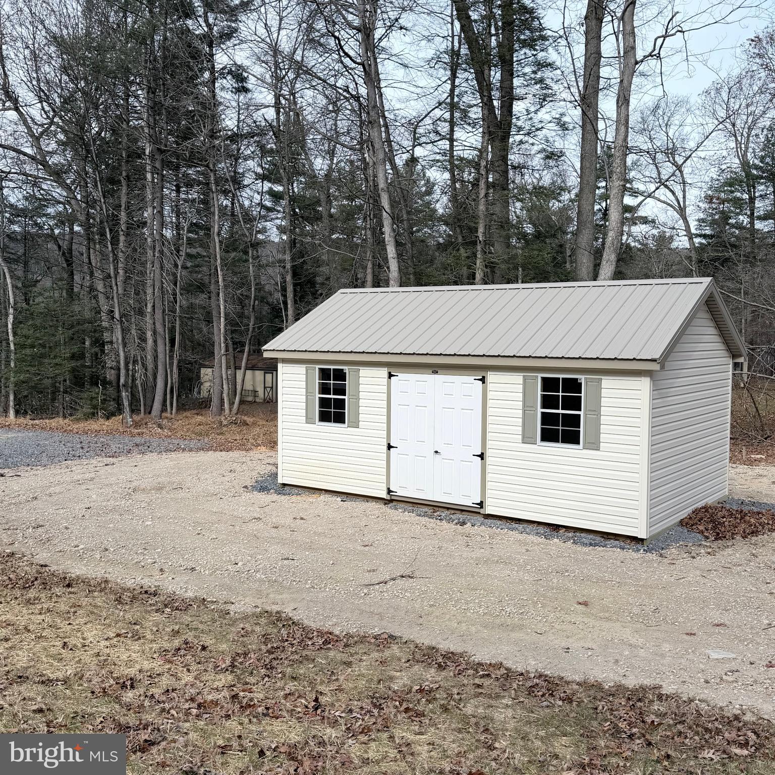 155 Buchanan Valley Road Orrtanna, PA 17353 - Photo 54 of 61 a view of a white house with a large tree in front of it