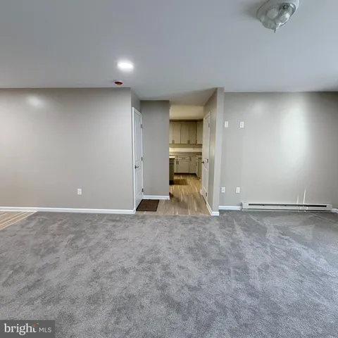 a view of a big room with a fireplace