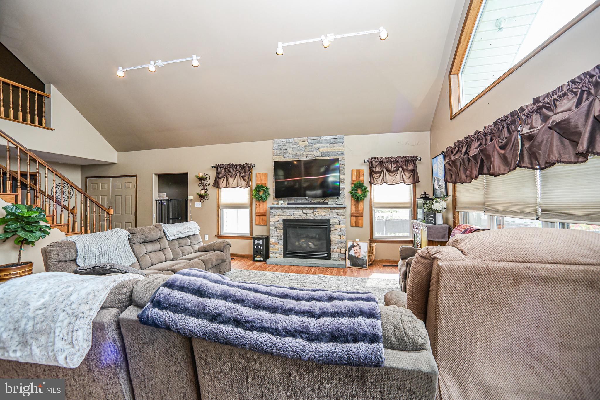 345 Kauffroth Road Narvon, PA 17555 - Photo 19 of 88 a living room with furniture fireplace and a flat screen tv