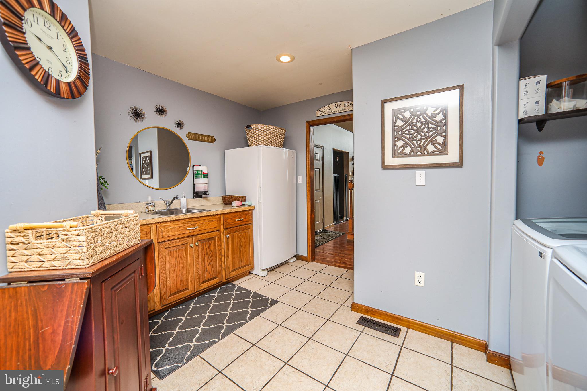 345 Kauffroth Road Narvon, PA 17555 - Photo 32 of 88 a view of kitchen with stainless steel appliances granite countertop a refrigerator and a stove top oven