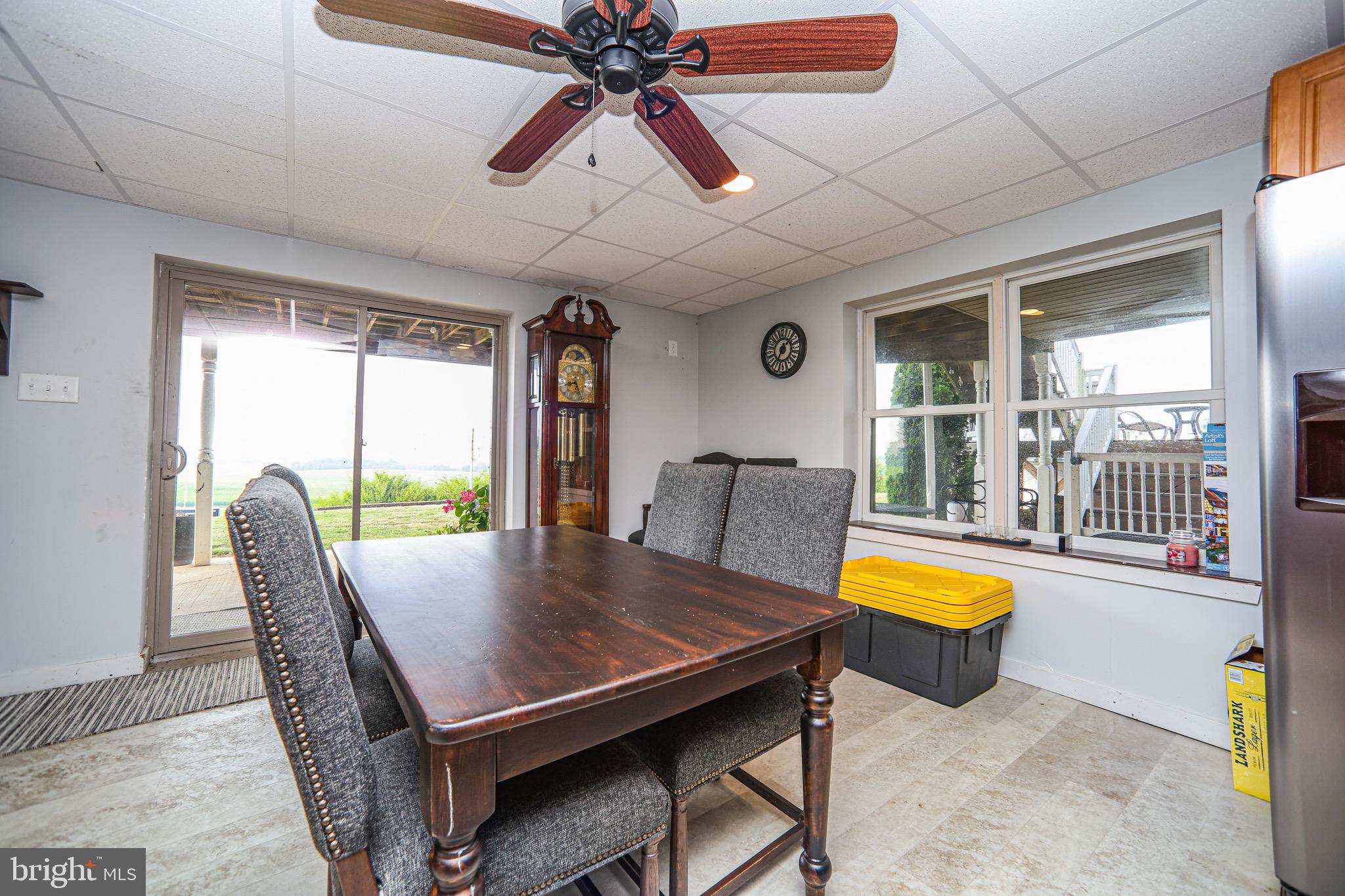 345 Kauffroth Road Narvon, PA 17555 - Photo 35 of 88 a view of a dining room with furniture and a large window