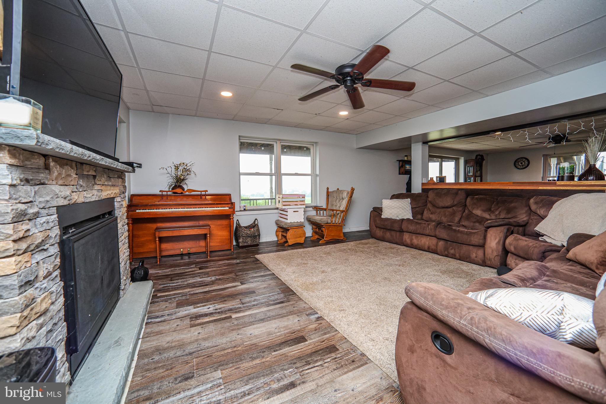 345 Kauffroth Road Narvon, PA 17555 - Photo 49 of 88 a living room with furniture and a fireplace