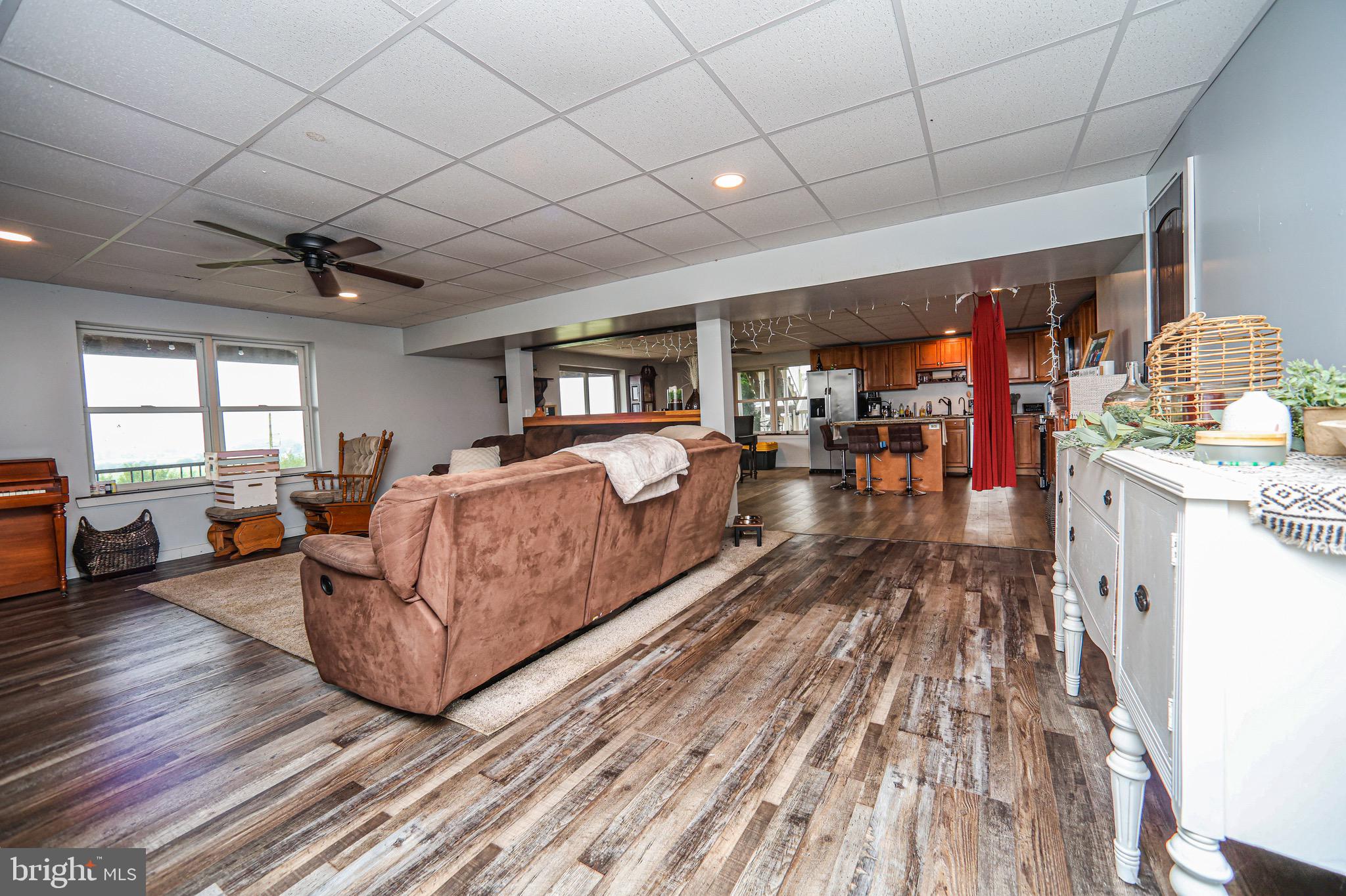 345 Kauffroth Road Narvon, PA 17555 - Photo 50 of 88 a living room with furniture and a wooden floor