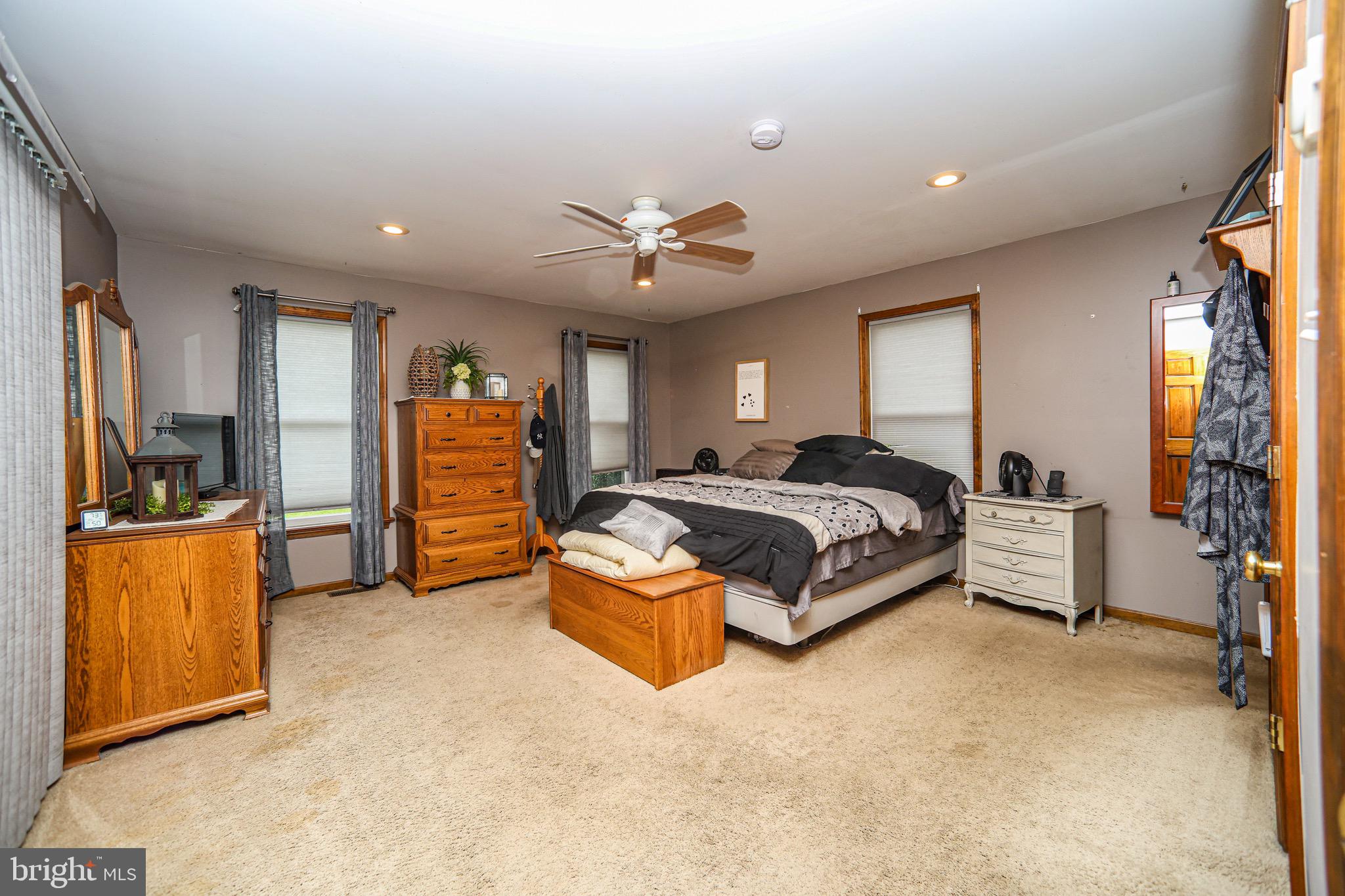 345 Kauffroth Road Narvon, PA 17555 - Photo 55 of 88 a spacious bedroom with a bed and a walk in closet