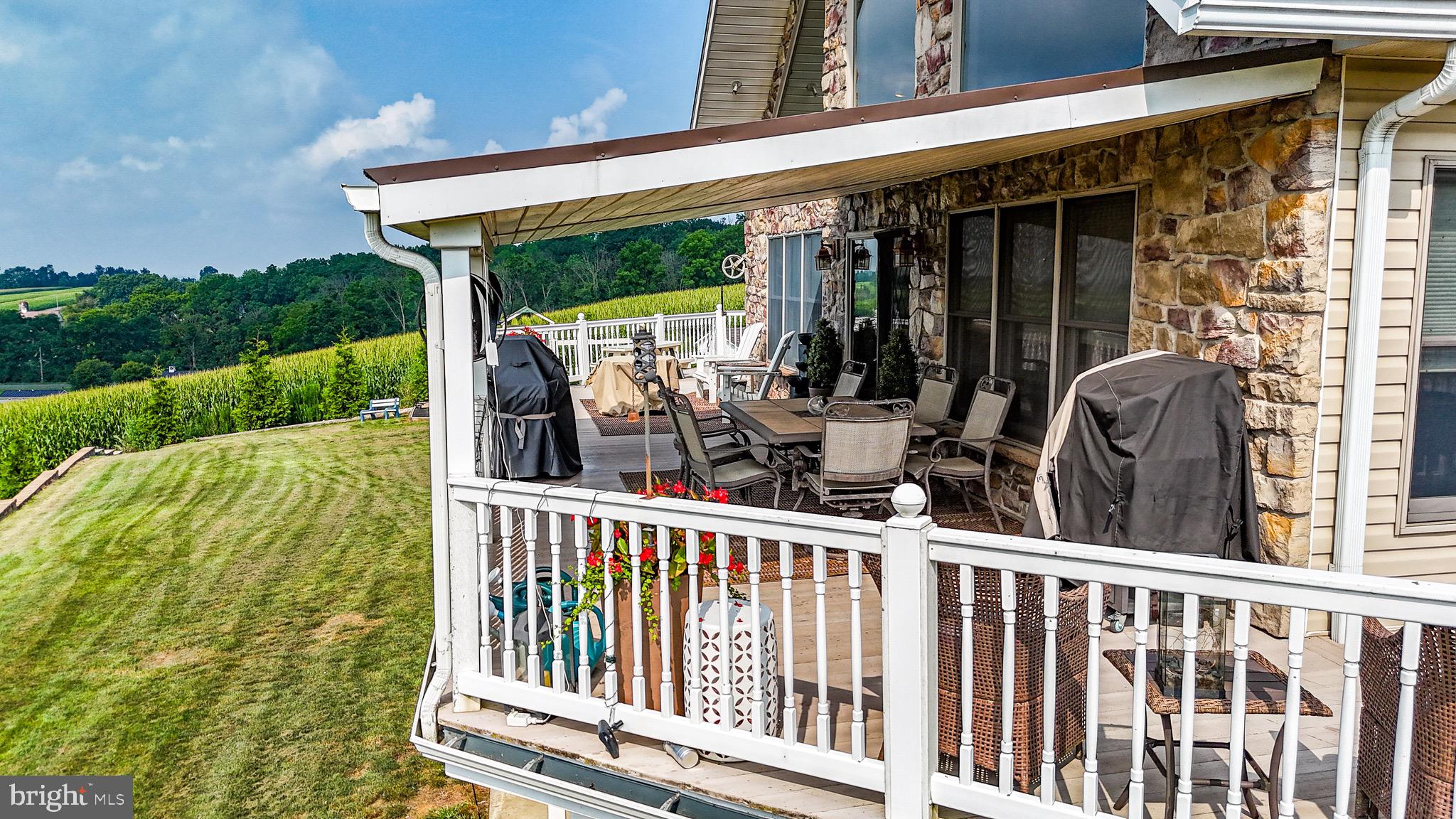 345 Kauffroth Road Narvon, PA 17555 - Photo 6 of 88 a view of a house with a porch and furniture