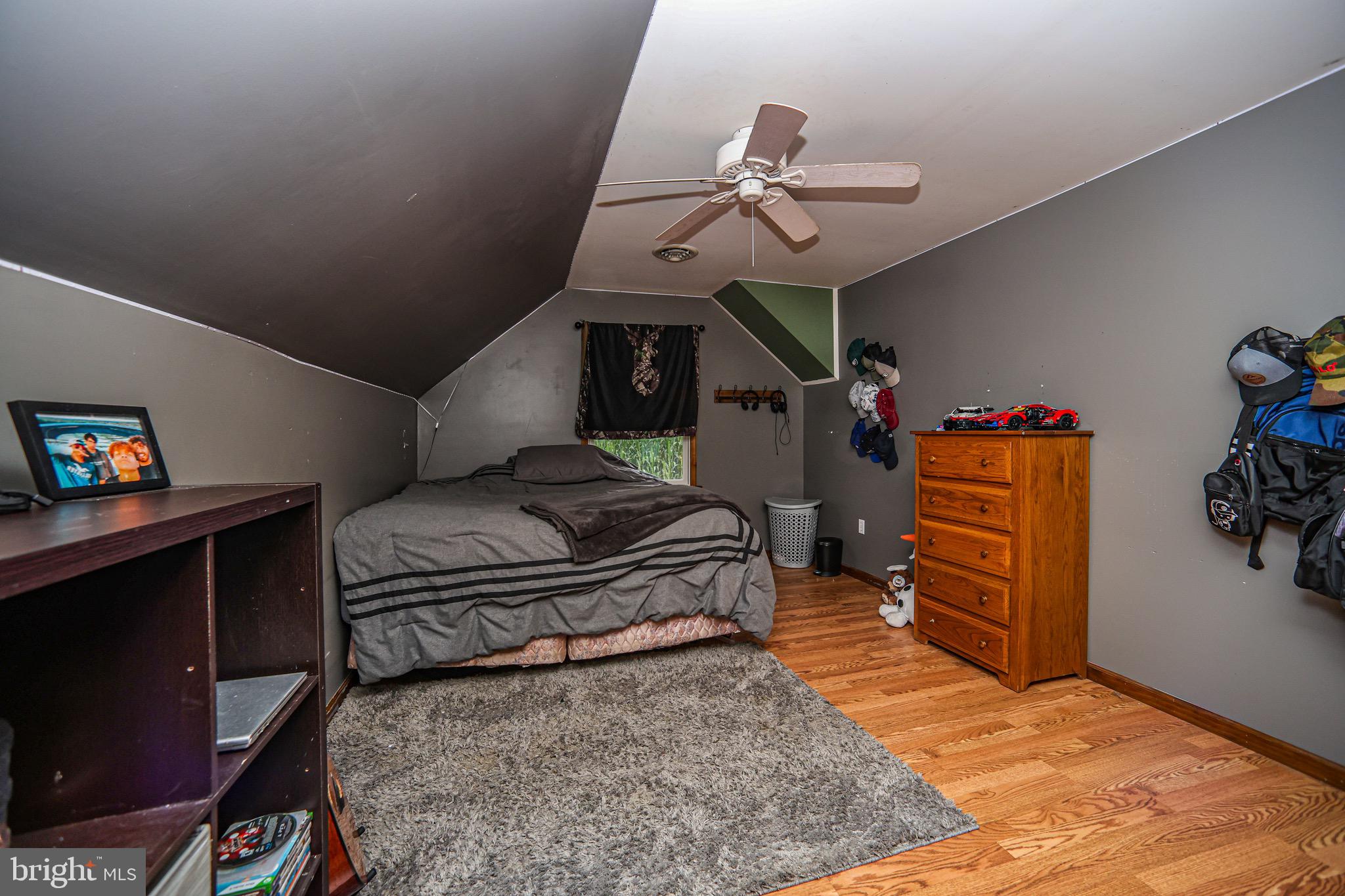 345 Kauffroth Road Narvon, PA 17555 - Photo 61 of 88 a bedroom with a bed and wooden floor