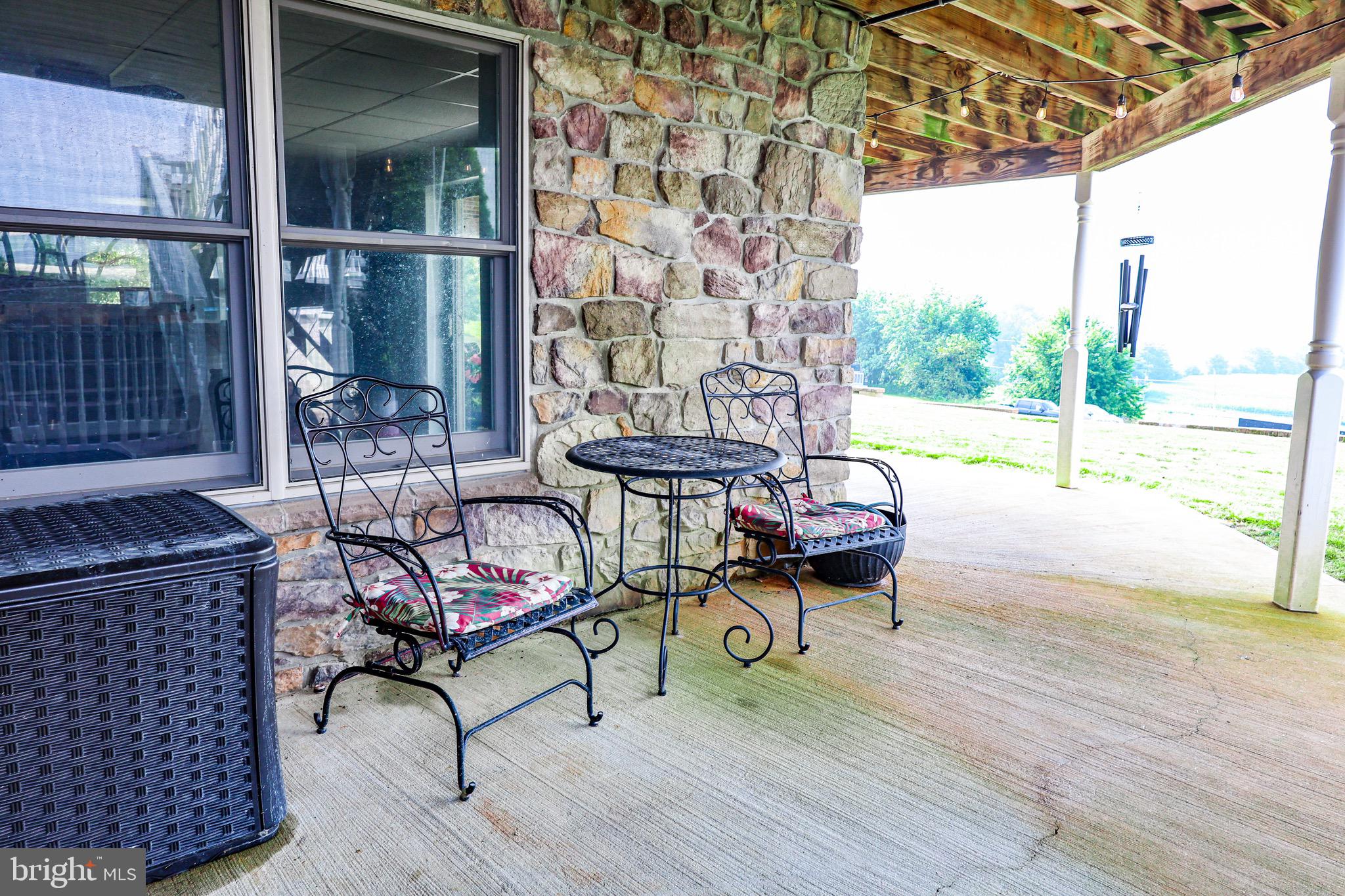 345 Kauffroth Road Narvon, PA 17555 - Photo 68 of 88 a swimming pool with outdoor seating and wooden floor