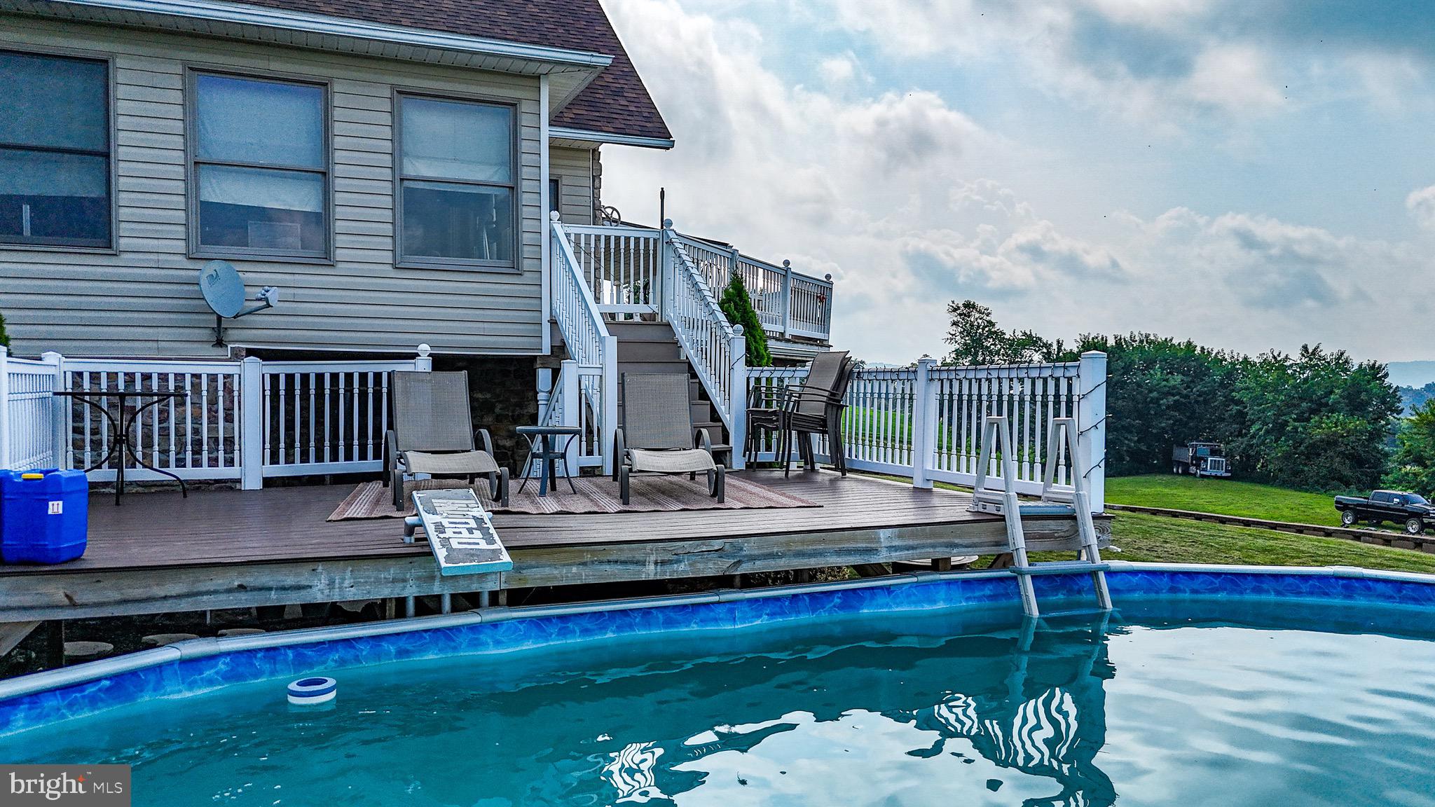 345 Kauffroth Road Narvon, PA 17555 - Photo 78 of 88 a view of house with swimming pool and outdoor seating