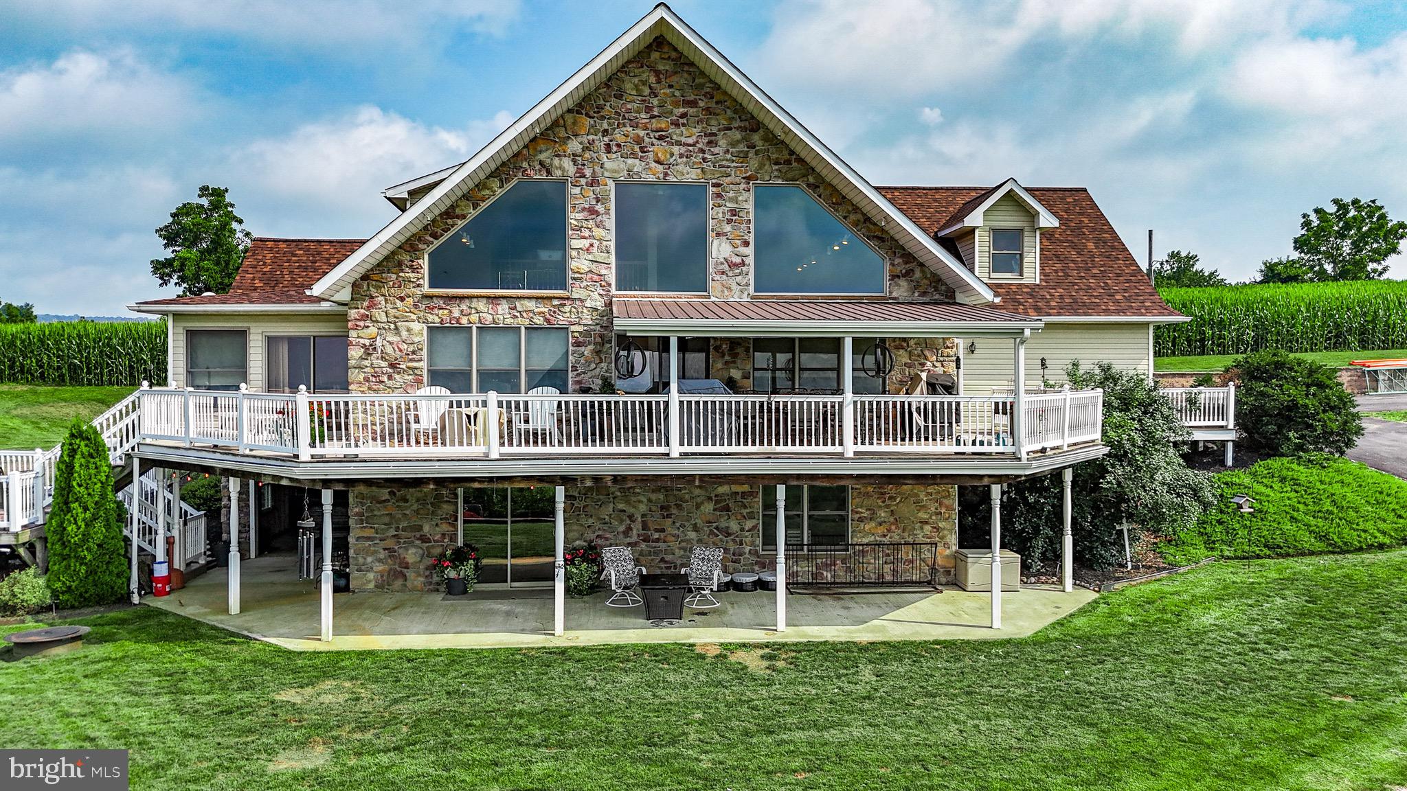 345 Kauffroth Road Narvon, PA 17555 - Photo 84 of 88 a aerial view of a house with a wooden deck and a yard