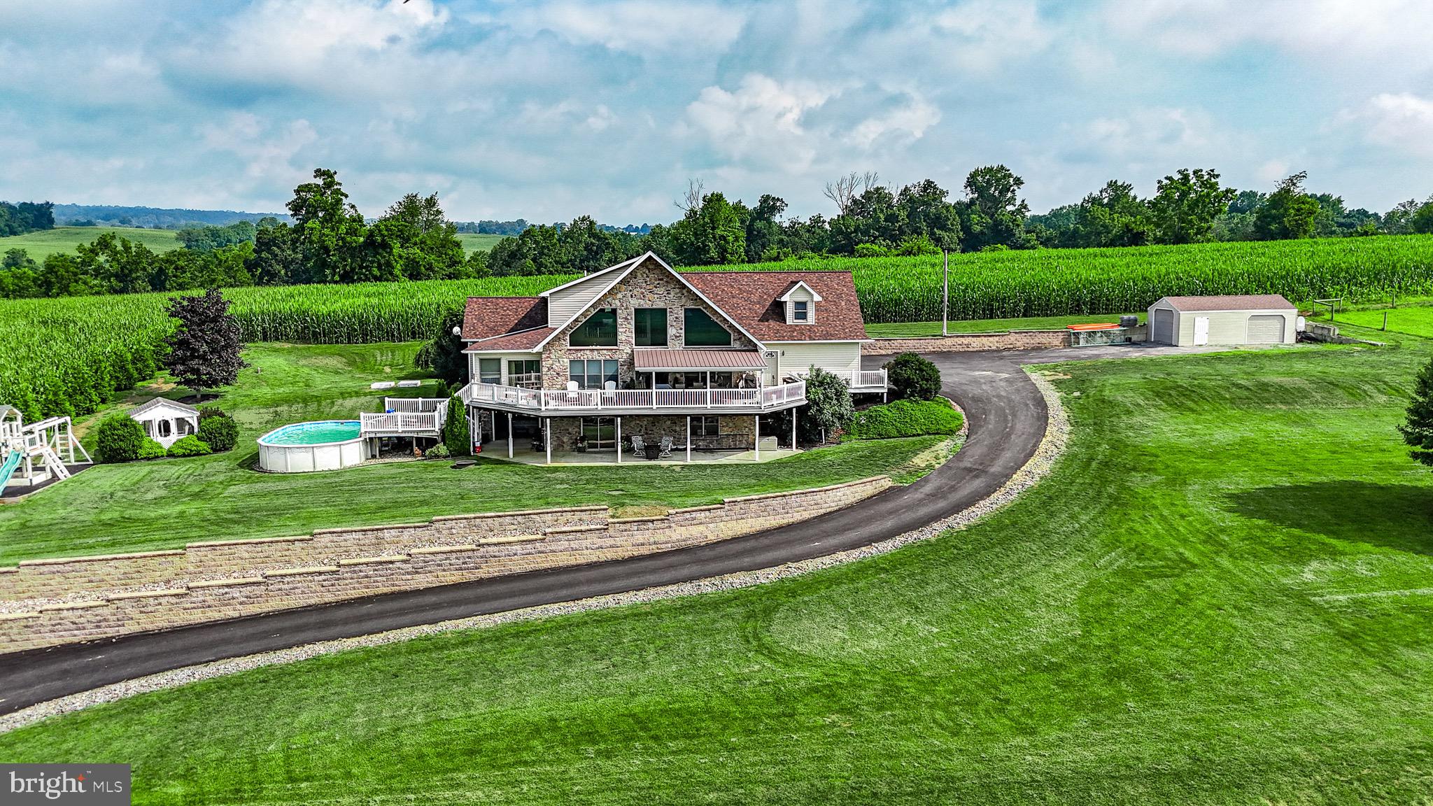 345 Kauffroth Road Narvon, PA 17555 - Photo 88 of 88 an aerial view of a house with a big yard and potted plants