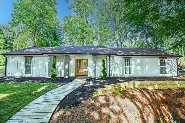 a view of a house with a swimming pool