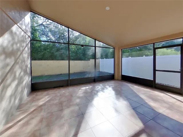 a view of a room with a large window